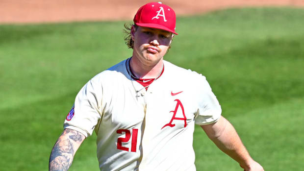 Razorbacks pitcher Mason Molina comes off the mound Sunday